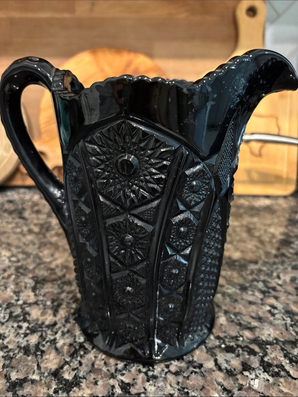 This is a vintage Indiana Glass pitchert in the "Monarch" pattern very heavy
